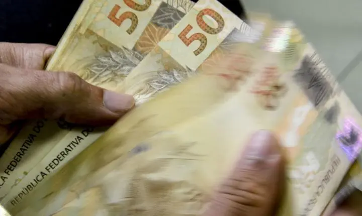Caixa começa a pagar Bolsa Família de maio